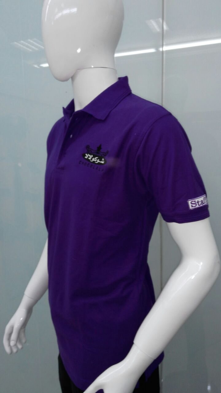 Purple short-sleeve shirt with an embroidered logo on the chest on a mannequin